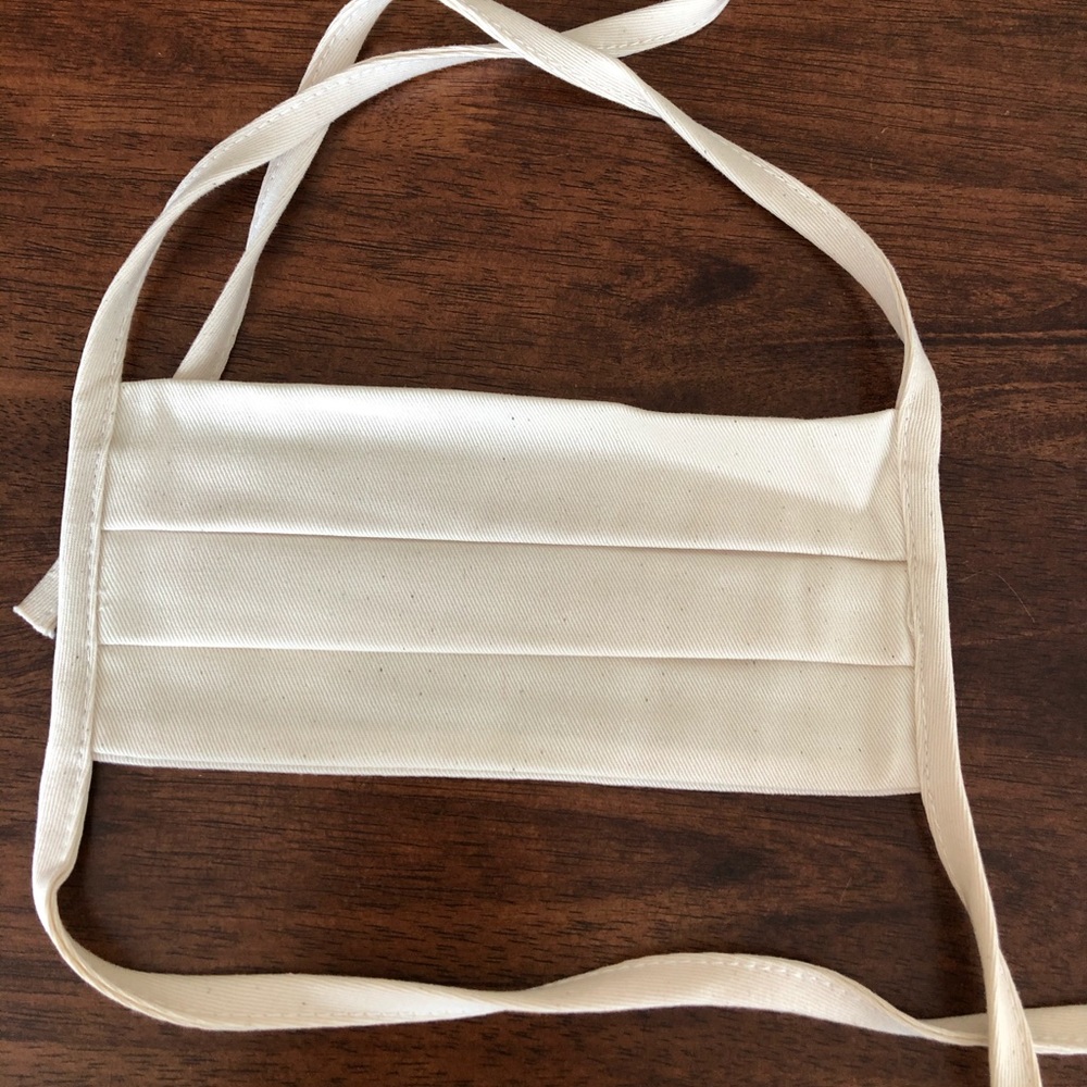 4 Reformation ivory colored masks never tried on